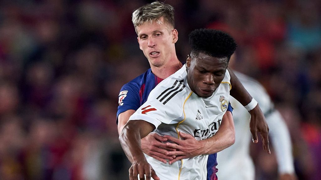 Dani Olmo of FC Barcelona Aurelian Tchouameni of Real Madrid 2026